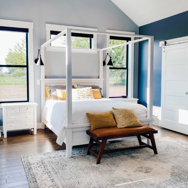 Framed bed in a bedroom Framed bed in a bedroom