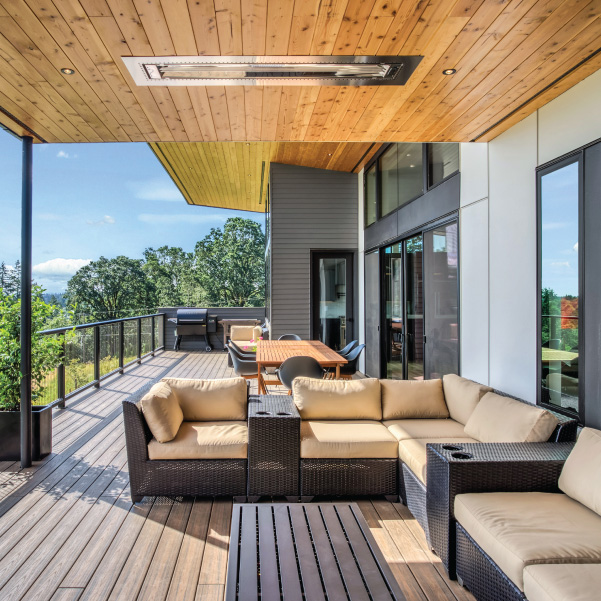 An outdoor deck of a modern home featuring industrial design built by Riddle Construction An outdoor deck of a modern home featuring industrial design built by Riddle Construction
