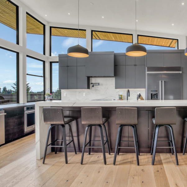 Industrial modern kitchen featuring standalone cabinetry to capture views Industrial modern kitchen featuring standalone cabinetry to capture views