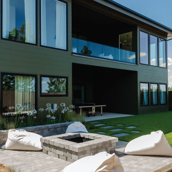 Outdoor firepit with bean bag seats at Lagom built by Riddle Construction Outdoor firepit with bean bag seats at Lagom built by Riddle Construction