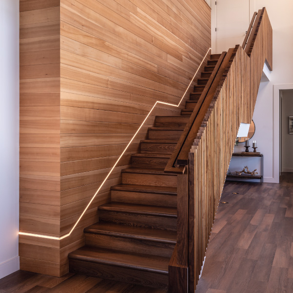 Wood staircase in an Oregon coast home built by Riddle Construction Wood staircase in an Oregon coast home built by Riddle Construction