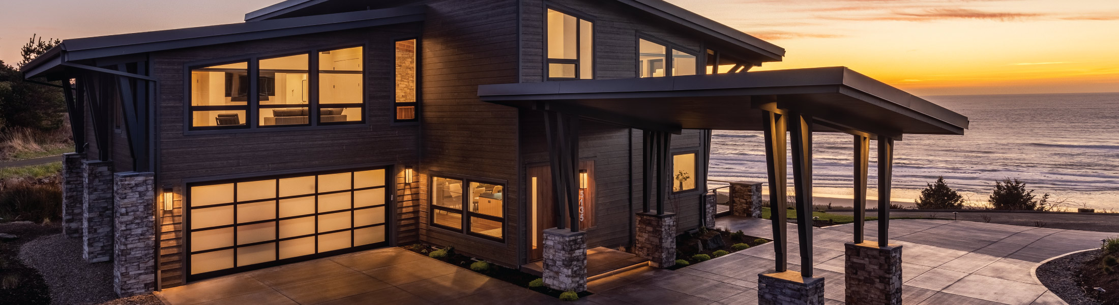 Exterior of a custom modern coastal home built by Riddle Construction Modern Coastal Sanctuary