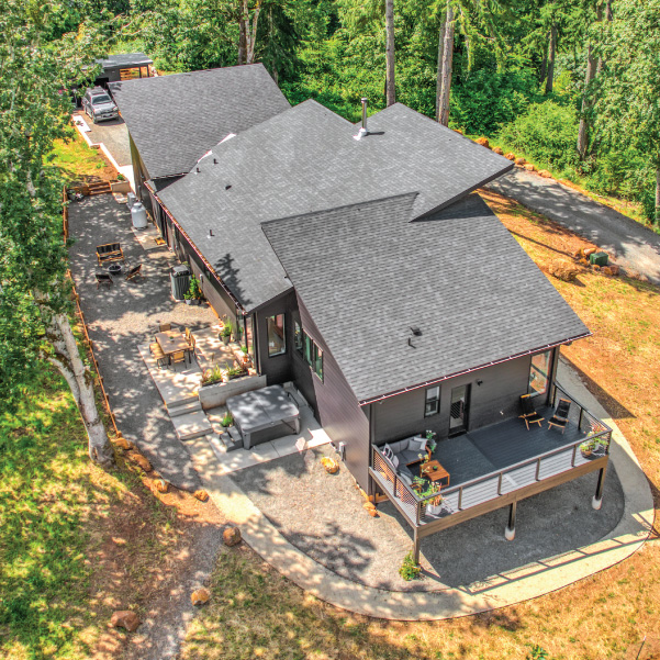 Aerial view looking down on a modern home built by Riddle Construction Aerial view looking down on a modern home built by Riddle Construction
