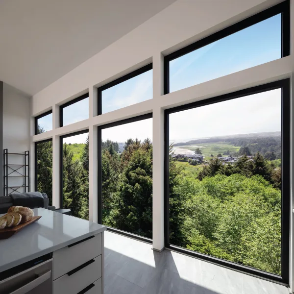 View windows from the kitchen and living area of a custom Oregon Coast cliffside house View windows from the kitchen and living area of a custom Oregon Coast cliffside house