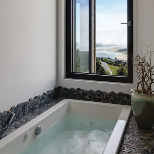 Soaking tube with a view in a custom Oregon Coast home Soaking tube with a view in a custom Oregon Coast home