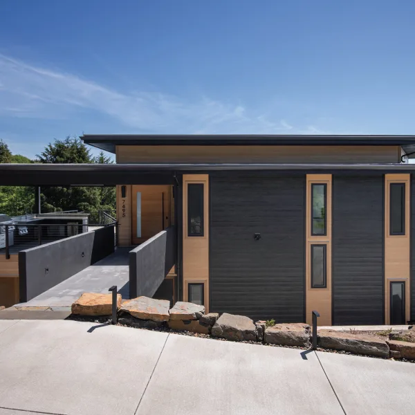 Entry over a bridge into a custom home at the Oregon Coast