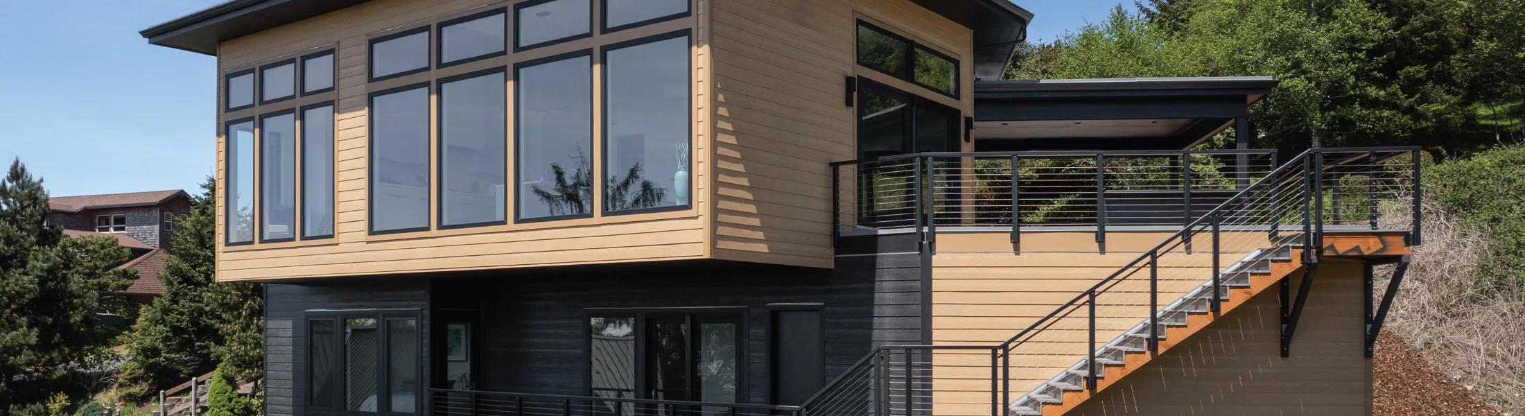 View windows of a custom home at the Oregon Coast Estuary Vista Home