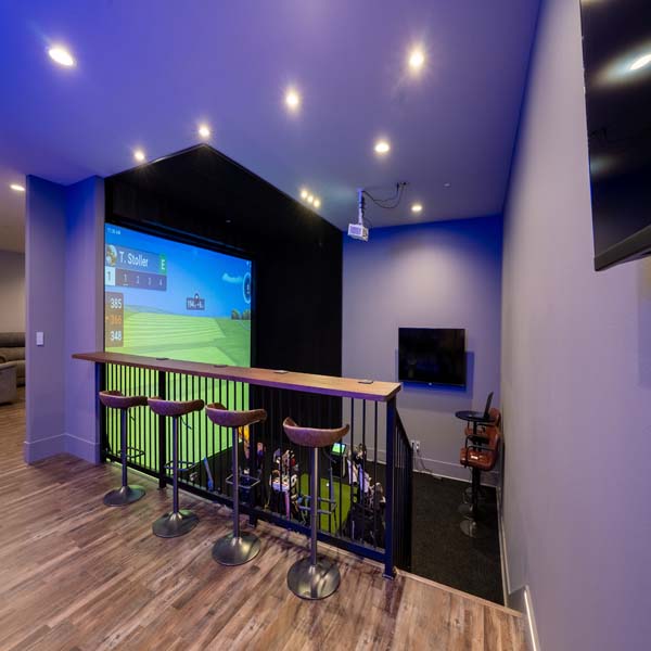 Riddle_Construction_Water_Hazard_Golf_Simulator Golf simulator in a modern craftsman built by Riddle Construction in McMinnville, Oregon
